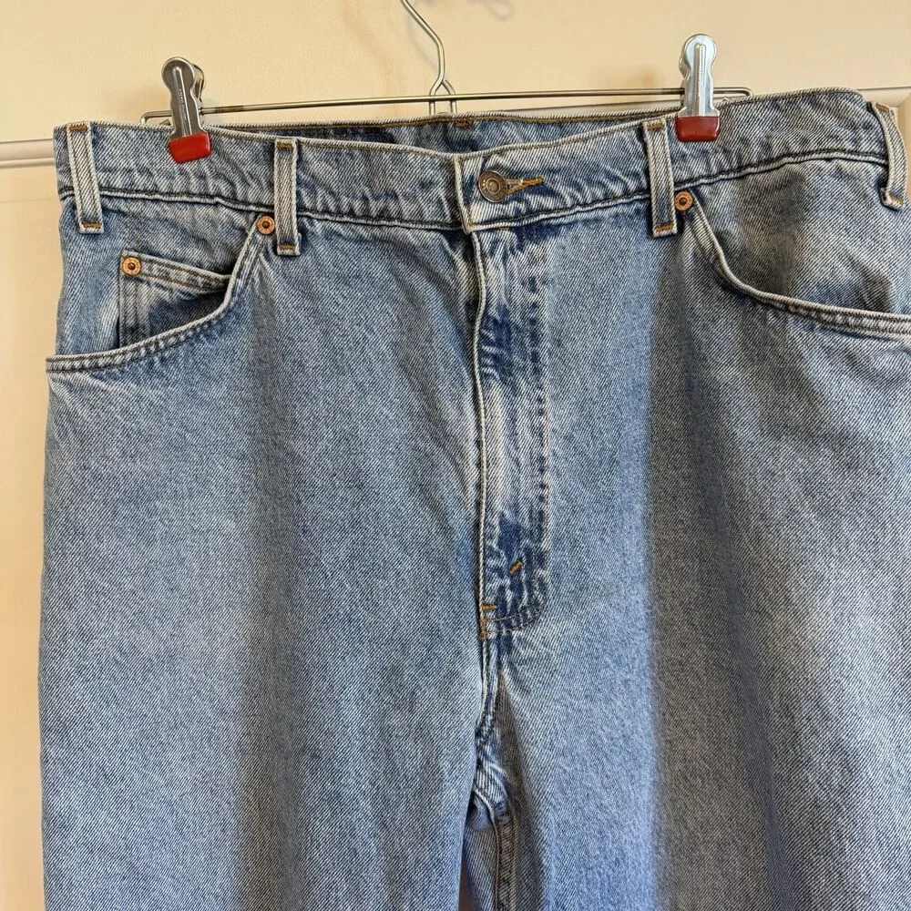 Vintage Levi’s 550 Jeans Men’s 38x30 Relaxed Fit Tapered Leg Light Wash orange
